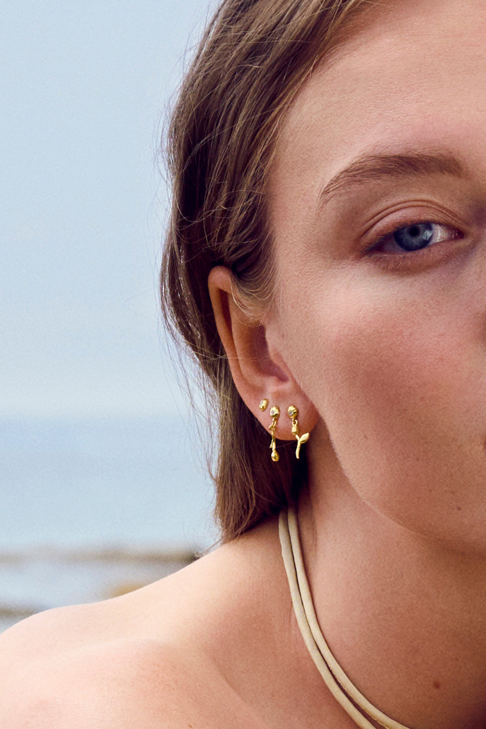 Caia ørestikker - forgyldt