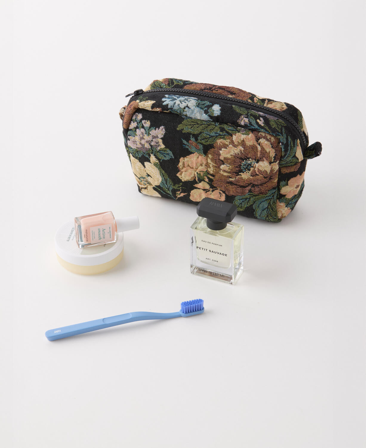 Toilettaske, sort blomstret - 22x30 cm