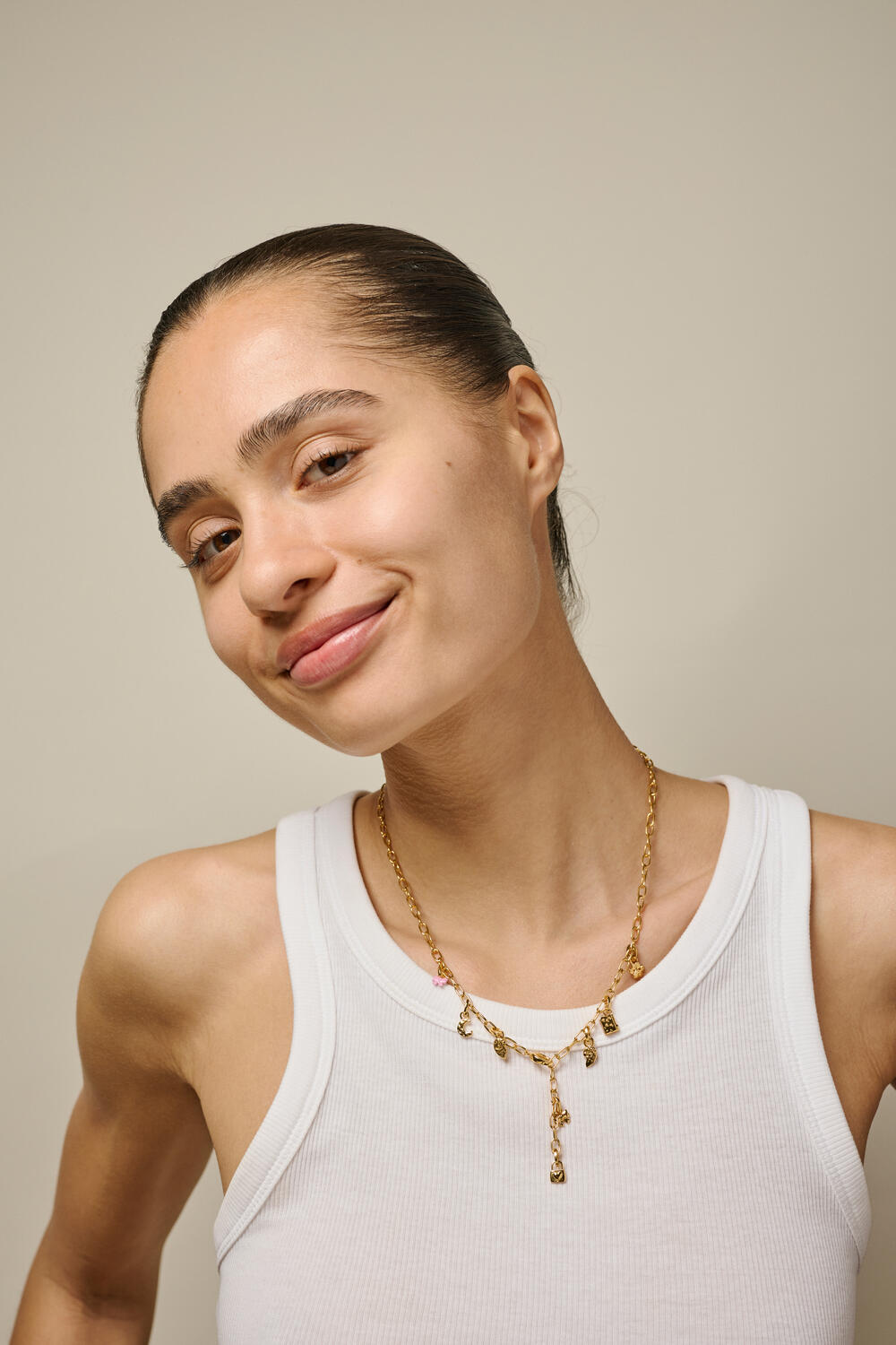 Baby Bow vedhæng - forgyldt/pink