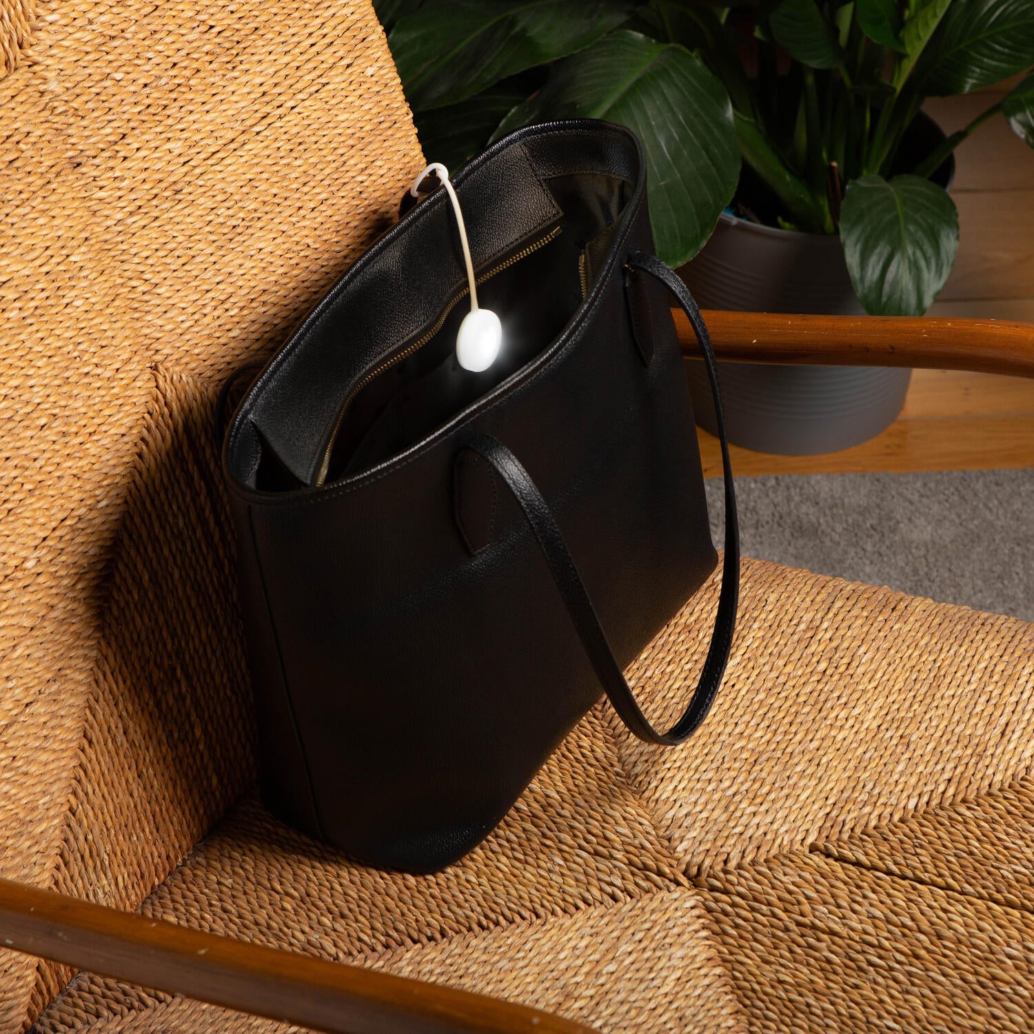 Genopladeligt taskelys