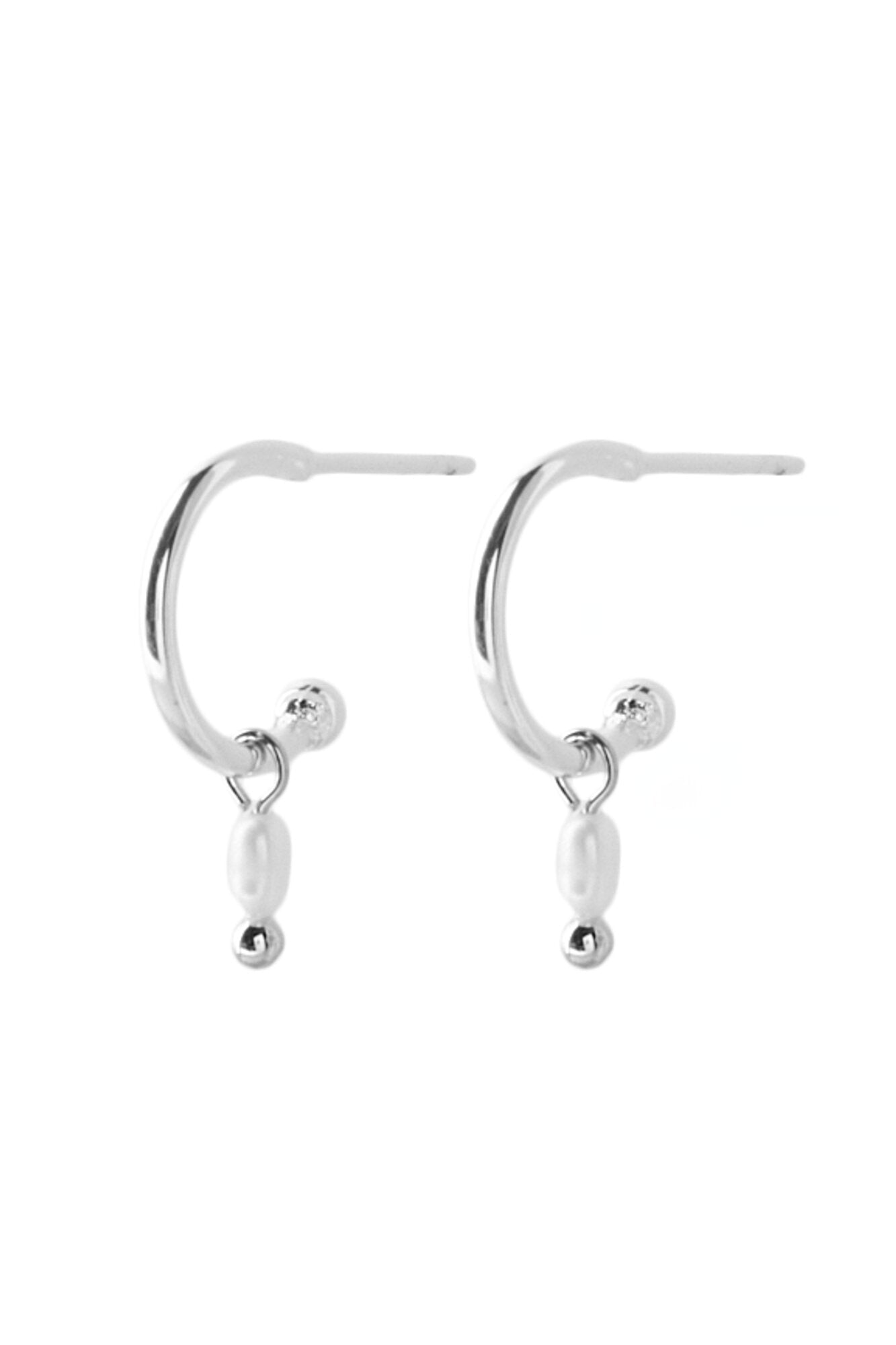 Mini white pearl øreringe - sølvfarvet